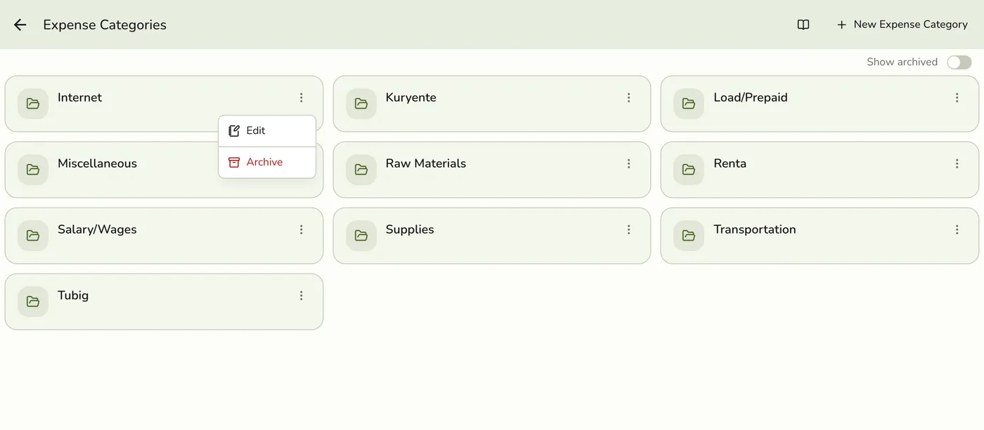 The Actions overflow menu open on an expense category card, showing Edit and Archive options