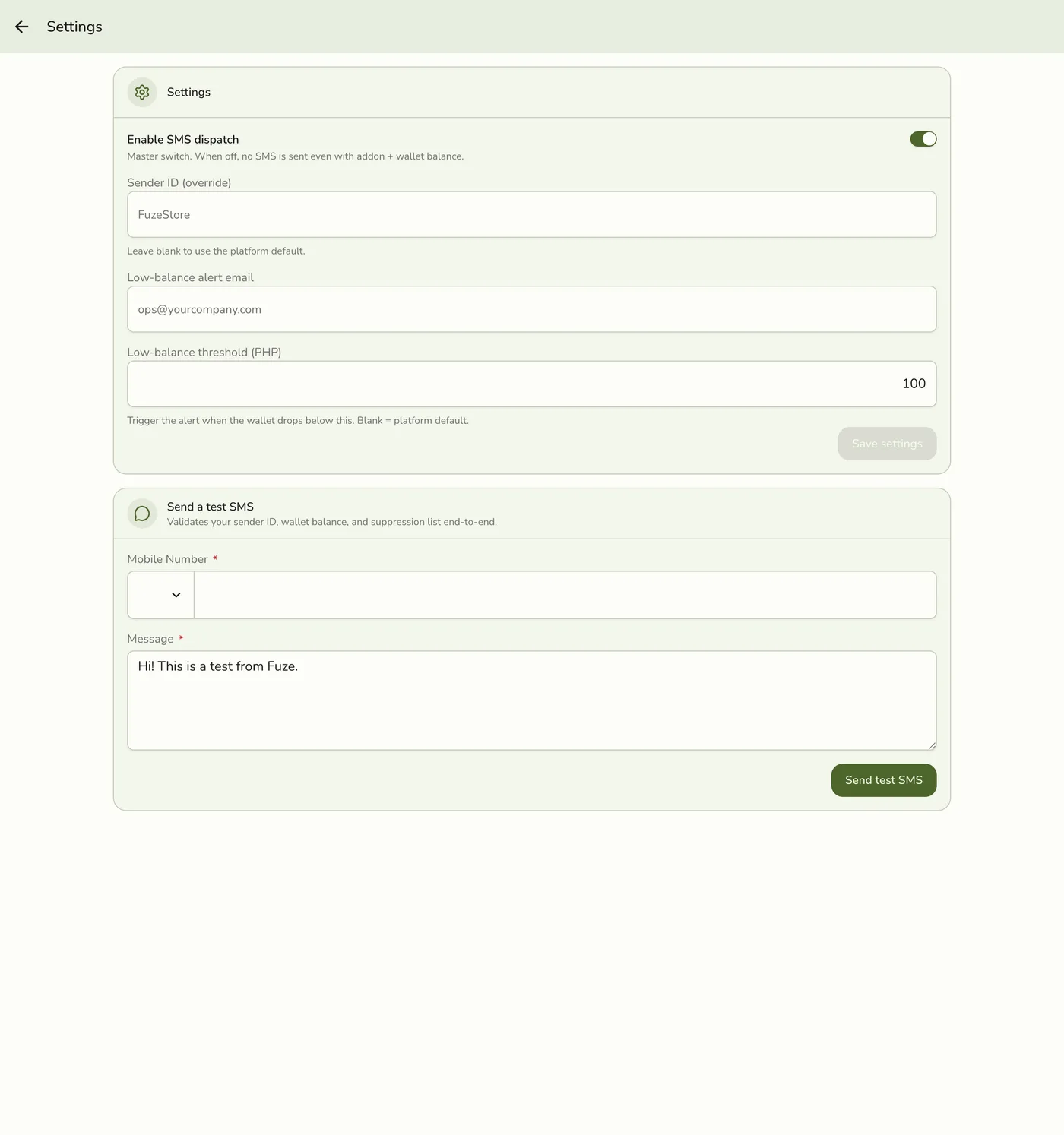 The SMS Settings screen, showing the Enable SMS dispatch switch, Sender ID, low-balance alert fields, and a Send a test SMS section