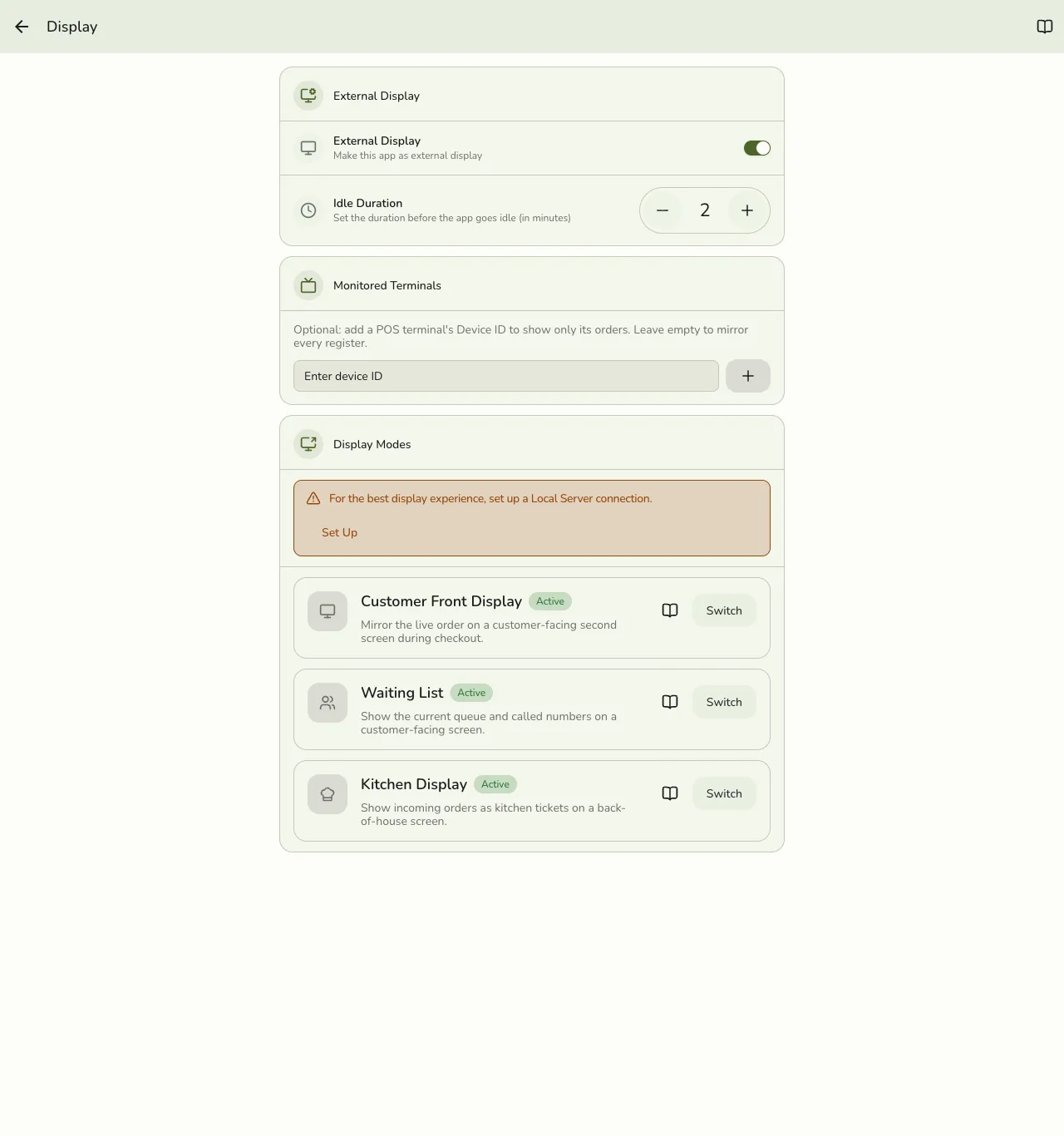 The Display settings screen in Fuze Store with External Display on, Monitored Terminals, and Display Modes cards for Customer Front Display, Waiting List, and Kitchen Display, each with a Switch button